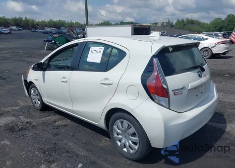 2015 Toyota Prius C One from USA, damaged, VIN JTDKDTB37F1094645